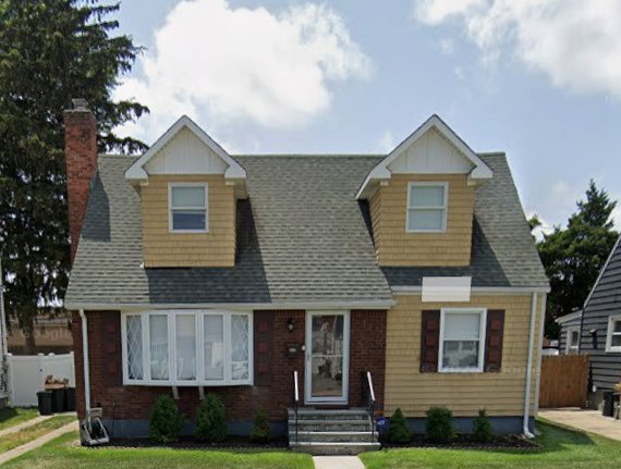 32 Aster Ave, Merrick — a Long Island cape after renovation, bought rather than rented