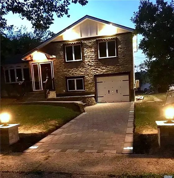 The finished home at dusk