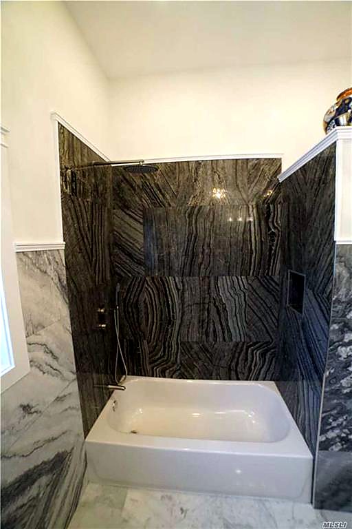 Second-floor bath, marble tub surround