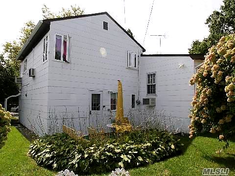 Rear of the house and yard before